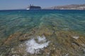 Nice Photo Of The Aegean Sea Breaking Against The Rocks With A Big Cruise In The Background On The Island Of Mykonos. Art History