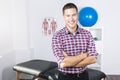 Physiotherapist rehabilitating at job