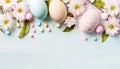 Nice pink, blue and beige easter eggs on turquoise wood background