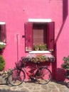 Pretty bike near the pink house on Burano island