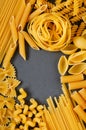 Nice postcard, background for the menu - italian traditional fettuccine pasta nests on a gray background