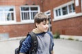 Nice Pre-teen boy outside at school having good time Royalty Free Stock Photo