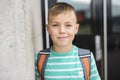 Pre teen boy outside at school Royalty Free Stock Photo