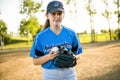 The pre-teen child girl in baseball field