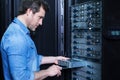 Nice professional technician installing the blade server Royalty Free Stock Photo
