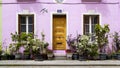 Nice purple house decorated with flowers, beautiful street in Paris, France Royalty Free Stock Photo