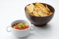 Nice red salsa and corn chips on white background. Royalty Free Stock Photo