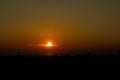 The nice red sunset at the end of the day on the sea beach Royalty Free Stock Photo