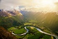 River meanders around fields seen from Romsdalseggen ridge, Andalsnes, Norway Royalty Free Stock Photo