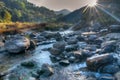 Nice river water flowing through rocks at dawn Royalty Free Stock Photo