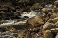 Nice River water flowing through stones and rocks at dawn Royalty Free Stock Photo