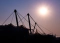 Nice roof construction of olympia stadium in munich with a beautiful sunset.