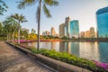 Nice Runing Track in the City Park under Skyscrapers at Sunrise