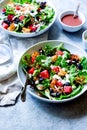 Nice italian salad with fork and sauce Royalty Free Stock Photo