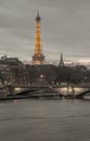 Nice scenery of Eiffel Tower and Seine River in Paris. View from Pont Alexandre III Bridge at sunset Royalty Free Stock Photo
