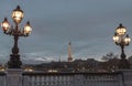 Nice scenery of Eiffel Tower and Seine River in Paris. View from Pont Alexandre III Bridge at sunset Royalty Free Stock Photo