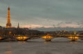 Nice scenery of Eiffel Tower and Seine River in Paris. View from Pont Alexandre III Bridge at sunset Royalty Free Stock Photo