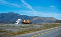 Nice semi truck white color cerry lamber cargo on step flat bed Royalty Free Stock Photo