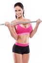 Nice woman doing workout with big dumbbell, retouched Royalty Free Stock Photo