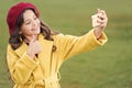 Nice shot. Application for smartphone. Modern communication. Girl hold smartphone taking selfie. Selfie for social