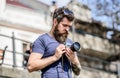 Nice shot. retro photographic equipment. hipster man in summer sunglasses. photo of nature. reporter or journalist Royalty Free Stock Photo