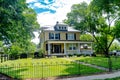 Nice single family home with veranda and large lawn to the front yard Royalty Free Stock Photo