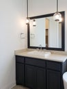 Sink and mirror of bathroom in a new house Royalty Free Stock Photo