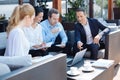 Nice smart colleagues listening to their manager Royalty Free Stock Photo