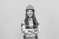 nice smile. building and construction concept. happy child worker wear hardhat.