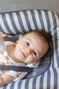 Simpatico baby smiling and happy in baby hammock Royalty Free Stock Photo