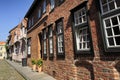Nice street with old brick houses, Lubeck, Germany Royalty Free Stock Photo