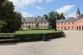 Nice sunny park with big trees and gravel path