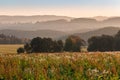 Nice sunset on hills with flower on meadow, Czech landscape Royalty Free Stock Photo