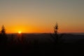 Nice sunset on lookout Nebelstein with trees and distant hill, Austria landscape Royalty Free Stock Photo