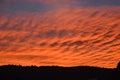 Nice sunset on the mountain ridges. Landscape with bright red blood color. Royalty Free Stock Photo