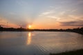 Nice sunset over lake water surface Royalty Free Stock Photo