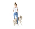 Nice teen woman and her beautiful Golden Retriever dog over white background Royalty Free Stock Photo