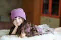 Nice toddler girl in purple hat Royalty Free Stock Photo