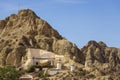 Nice troglodyte house imbedded in a tuff hill Royalty Free Stock Photo