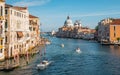 Nice view of grand canal and the classical building in venetian styles from Accademia bridge during evening in Venice , Italy Royalty Free Stock Photo