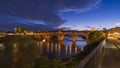 Nice view of Ponte Coperto (covered bridge) over Ticino river in Pavia at blue hour Royalty Free Stock Photo