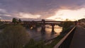 Nice view of Ponte Coperto (covered bridge) over Ticino river in Pavia at sunset Royalty Free Stock Photo