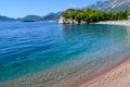 Nice view of the sea. The mountains descend into the sea. The mountains are covered with forests. Beautiful Lagoon. Adriatic Sea. Royalty Free Stock Photo