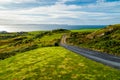 Tiny little road going downhill to the sea, Islay, Scotland Royalty Free Stock Photo
