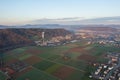 Nice village with many fields where farmers grow crops for the people to have enough food in this crisis. Royalty Free Stock Photo