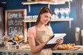 Nice waitress making notes Royalty Free Stock Photo
