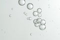 Spa bubbles soars over a grey background Royalty Free Stock Photo