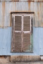 Nice window with old weathered wooden shutter in Valparaiso, Chile Royalty Free Stock Photo