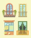 Nice windows in European style with small cozy balconys