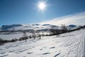 a nice winter landscape againstthe sun light in Jotunheim, norway